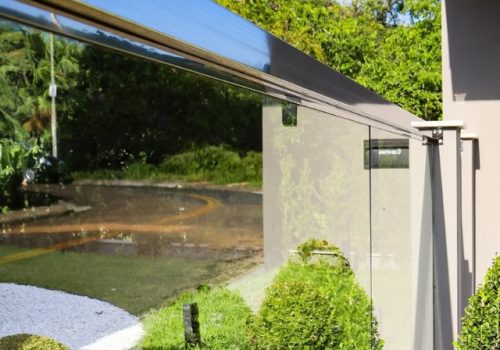 MURO DE VIDRO COM AÇO INOX